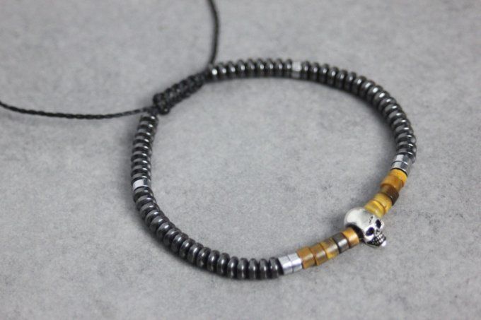 Bracelet perles heishi en oeil de tigre, hématite et tête de mort argent massif