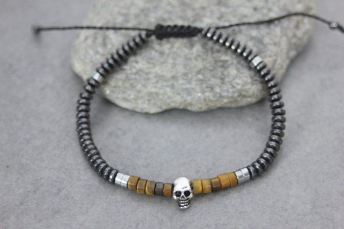 Bracelet perles heishi en oeil de tigre, hématite et tête de mort argent massif