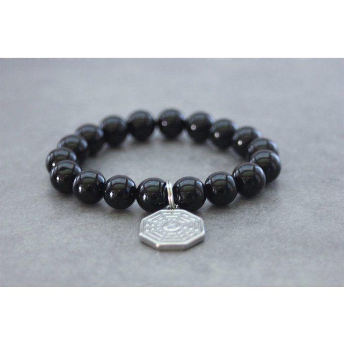 Bracelet perles onyx et breloque yin & yang en acier inoxydable