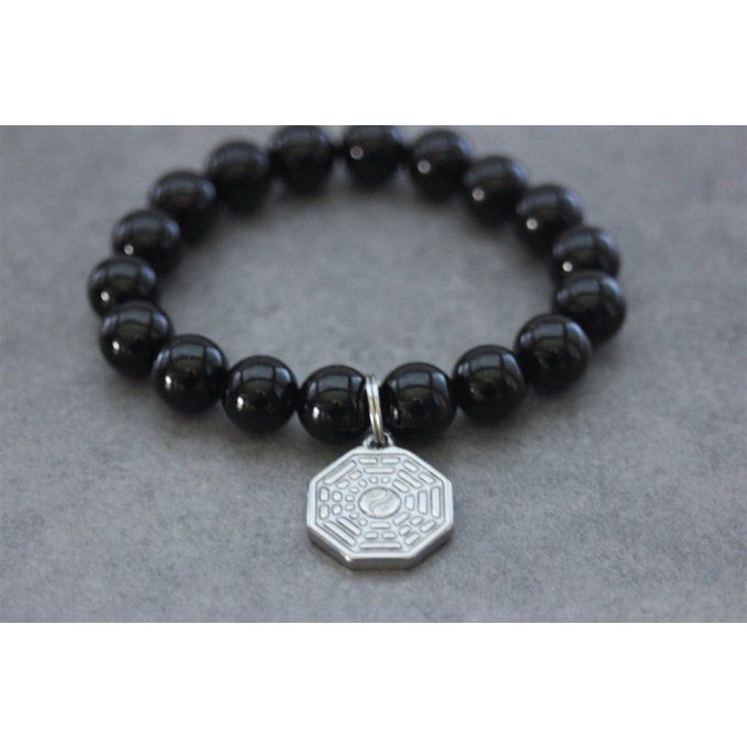 Bracelet perles onyx et breloque yin & yang en acier inoxydable