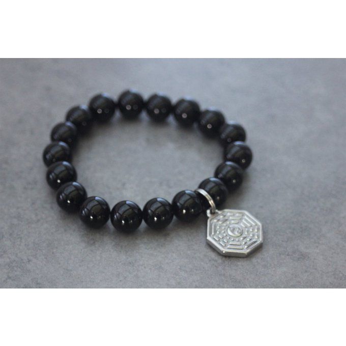 Bracelet perles onyx et breloque yin & yang en acier inoxydable