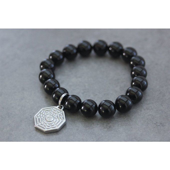 Bracelet perles onyx et breloque yin & yang en acier inoxydable