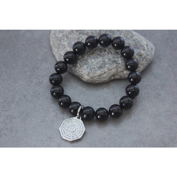 Bracelet perles onyx et breloque yin & yang en acier inoxydable