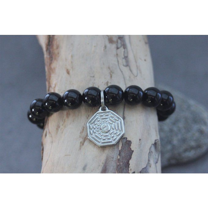 Bracelet perles onyx et breloque yin & yang en acier inoxydable