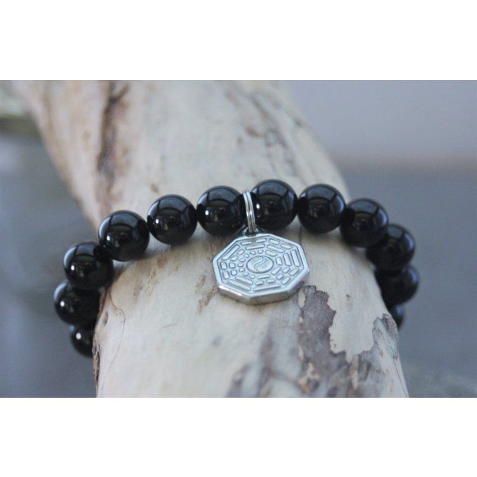 Bracelet perles onyx et breloque yin & yang en acier inoxydable