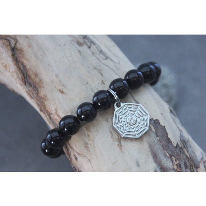 Bracelet perles onyx et breloque yin & yang en acier inoxydable